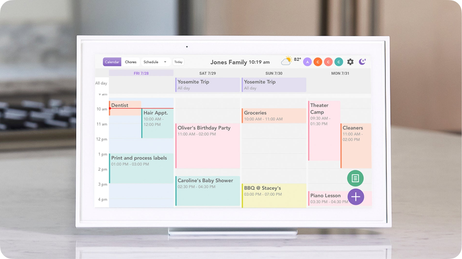 Skylight Smart Calendar Tablet on worksurface showing family calendar